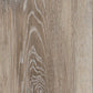 Vinylboden IPC Smaragd Eiche sperbergrau, Klebevinyl mit Holzmaserung und Grautönen, als Bodenbelag in einem Wohnraum.