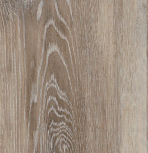 Vinylboden IPC Smaragd Eiche sperbergrau, Klebevinyl mit Holzmaserung und Grautönen, als Bodenbelag in einem Wohnraum.