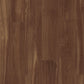 Vinylboden Tarkett iD Inspiration 40 Naturals Chestnut Smoked mit Holzmaserung und dunkler Maserung, Klebevinyl, Nahaufnahme.