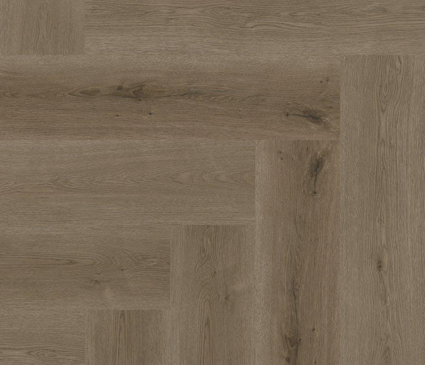 Vinylboden im Fischgrätenmuster aus Texas Oak von COREtec, Naturals Herringbone H86, zeigt die Holzstruktur und Farbnuancen.