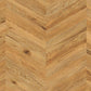 Vinylboden Project Floors floors@work Chevron PW 3840, Klebevinyl mit schwarzem Chevron-Muster auf hellem Hintergrund.